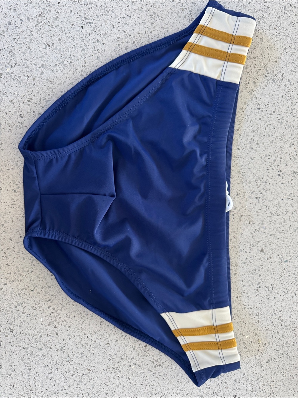 Coyote Men's Navy Swim Brief with Gold-Stripe Waist
